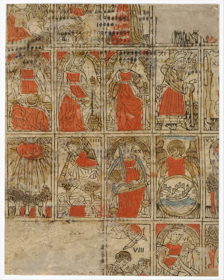 A photograph of an uncut sheet of early tarocchi cards, printed in red, blue and brown on aged paper. Some cards along the edges of the sheet are printed only in part.